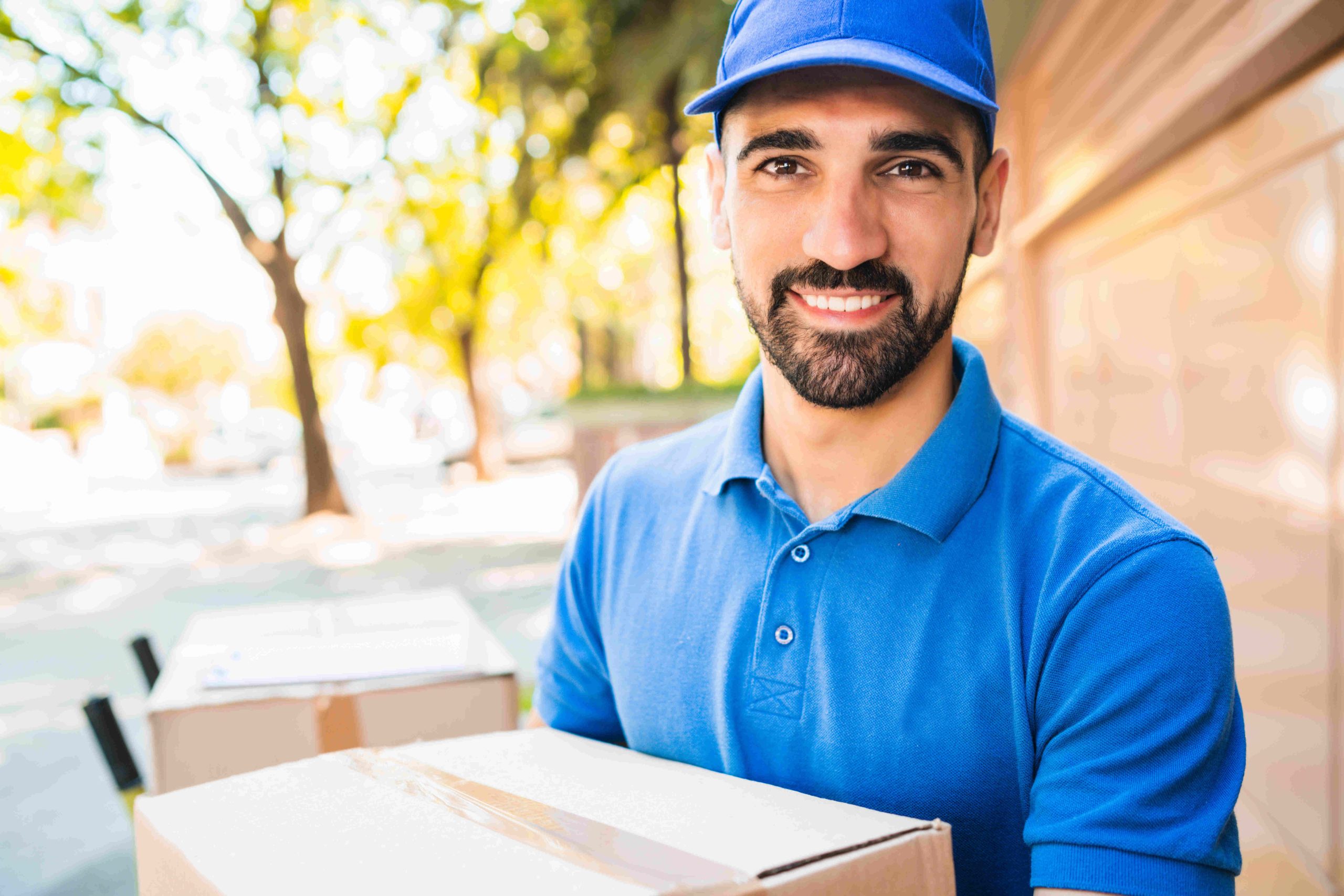 white-glove-services man holding a package